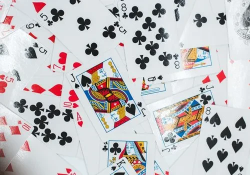 Jumbled up deck of cards presumably to be used in a game of spades