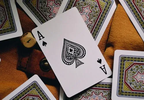 Cards being played on a table